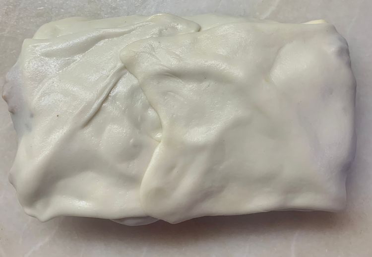 Step 3.3: Now fold the dough over the filling to form a square or a rectangular pocket, pressing the edges together to seal the filling inside
