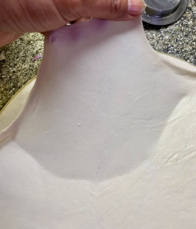 Step 3.2: Place the dough ball on a flat surface and carefully roll the ball with a rolling pin into a circle as thin as you want