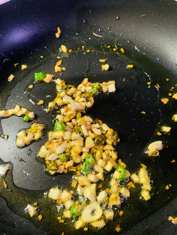 Step 2.1: Heat oil in a frying pan on medium heat