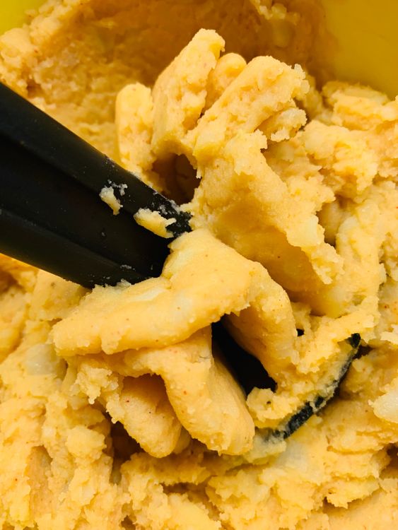 Step 1.1: Mash the potatoes and spices together with a potato masher to form a smooth mixture