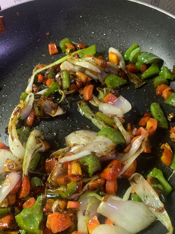 Step 2.2: Add black pepper, salt, white pepper, oregano, soy sauce and vinegar and stir on medium to high flame for a minute