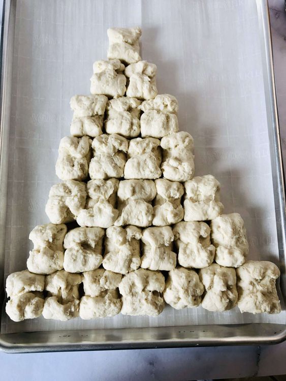 Step 2.1: Continue with 6 balls in the next row, 5 in the third row, and so on, until you have one ball at the top