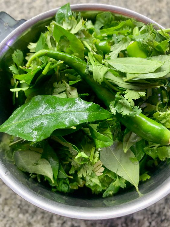 Step 2.1: Grind the leaves and green chillies with water in a grinder to make a smooth paste and keep aside