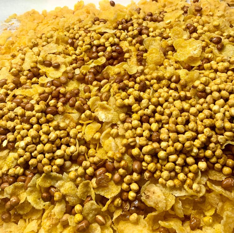 Step 2.6: Repeat the same process for the peanuts, roasted channa, dried coconut, dry red chillies and curry leaves