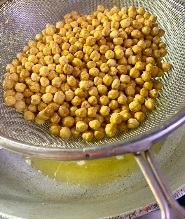 Step 2.5: Repeat the same process for the peanuts, roasted channa, dried coconut, dry red chillies and curry leaves