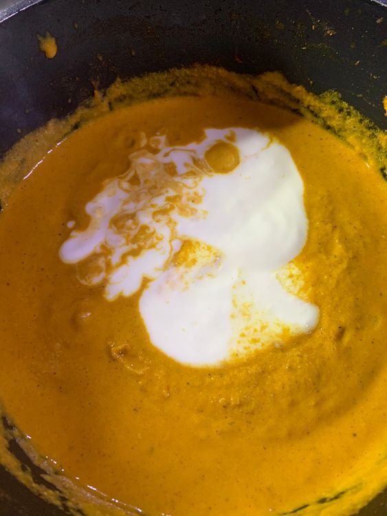 Step 3.1: Add whisked curd and a half cup of water and constantly keep stirring for 2-3 minutes so that it does not curdle