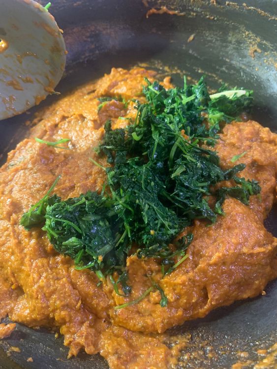 Step 2.1: Add sauteed fenugreek leaves to the pan, and cook for another minute