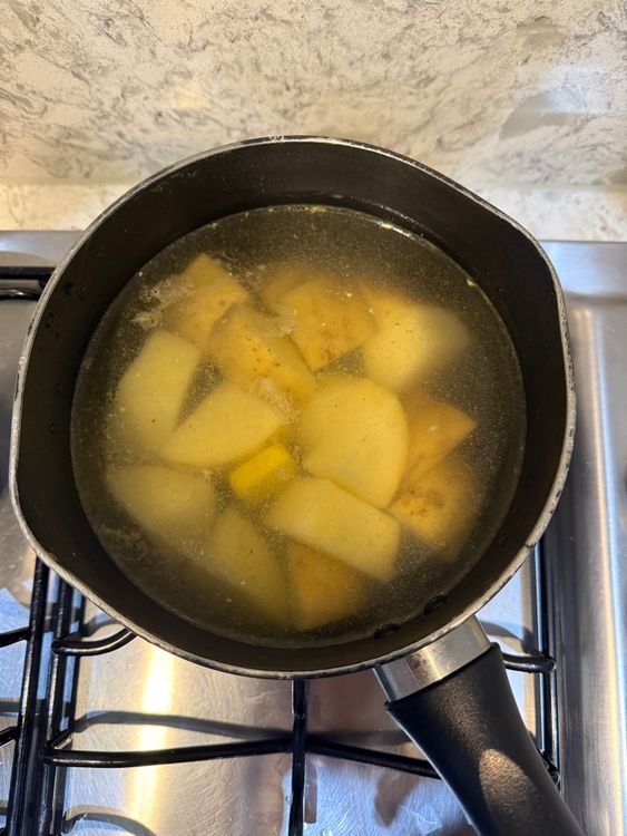 Step 1.1: Boil the potatoes with 1 chicken stock cube for 15 minutes until tender but still intact