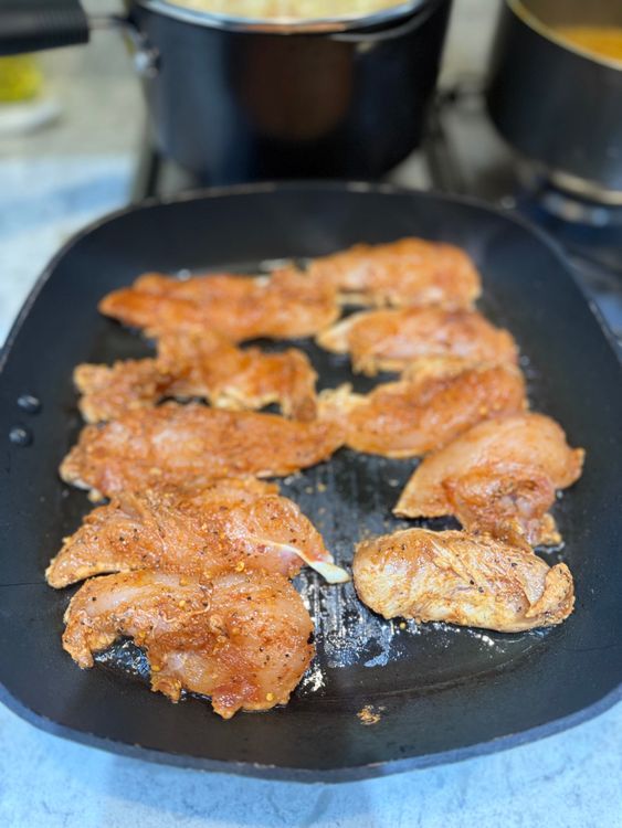 Step 2.1: Add the chicken to the pan and sear on both sides for two minutes each