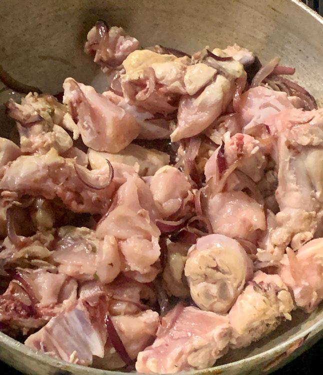 Step 2.1: Mix the chicken pieces well on high heat and cook until the chicken lightens its colour