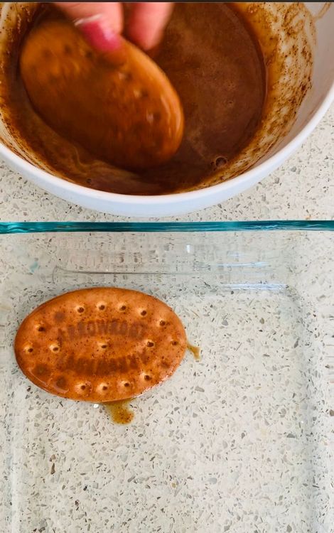 Step 1.1: Dip each biscuit in the mixture, then stack them in a row