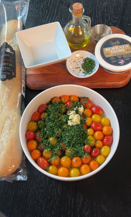 Step 1.1: Add grape tomatoes to a baking dish and drizzle with just enough olive oil to coat the bottom of the dish