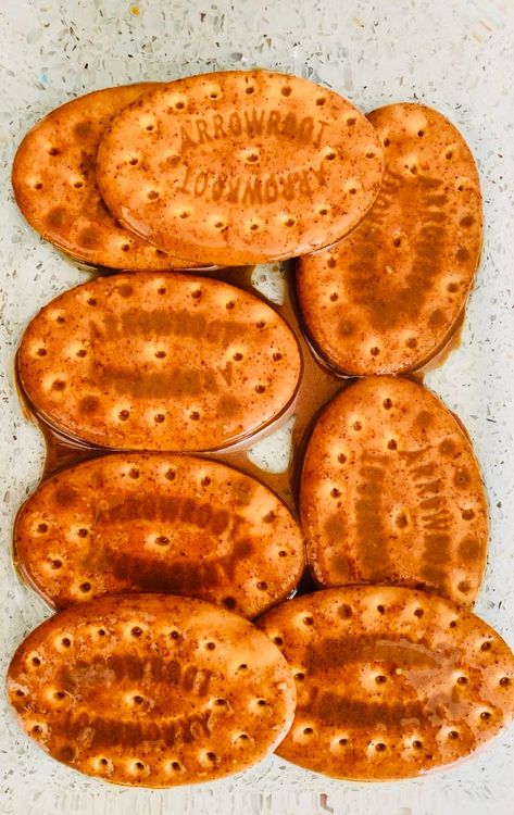 Step 1.2: Dip each biscuit in the mixture, then stack them in a row