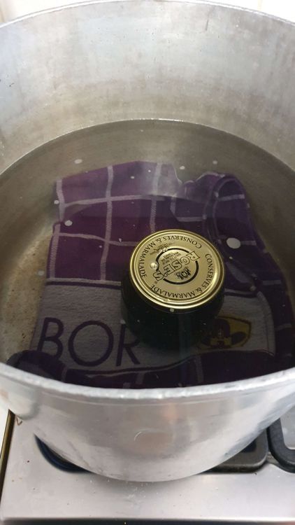 Step 2.1: Close your jars and grab a large canning pot and place a tea towel or rack at the bottom