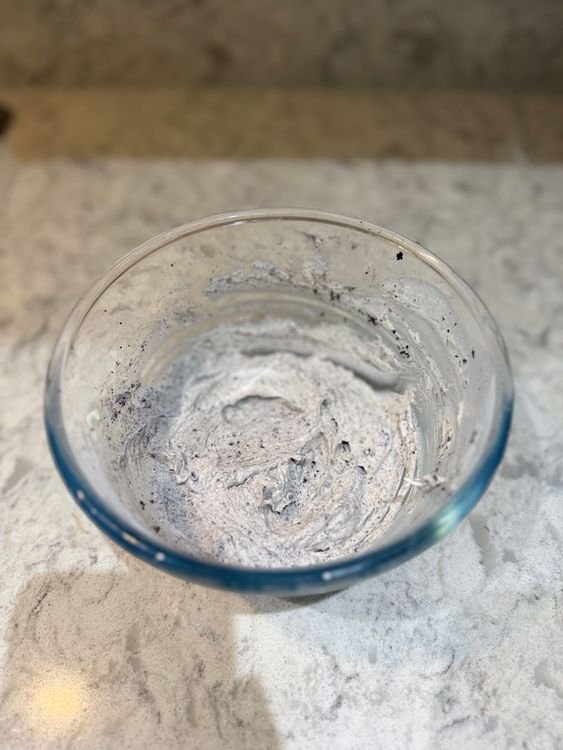 Step 3.1: Add the spare Oreo crumbs you set aside earlier to the bowl and mix until it thickens