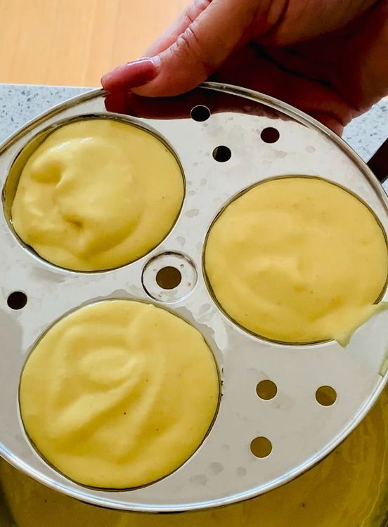 Step 1.1: Immediately pour the batter into the idli plates