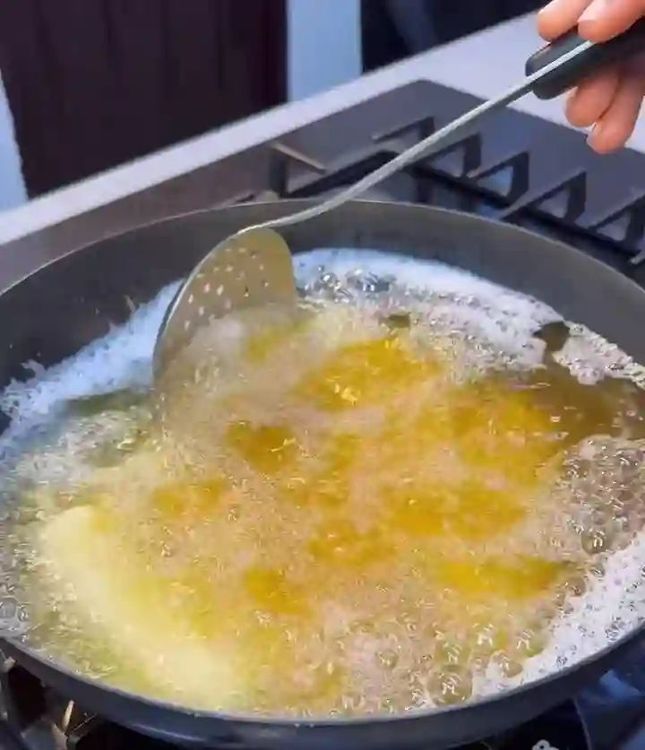 Step 3.3: Heat oil in a deep pan and fry the pies until both sides are golden brown