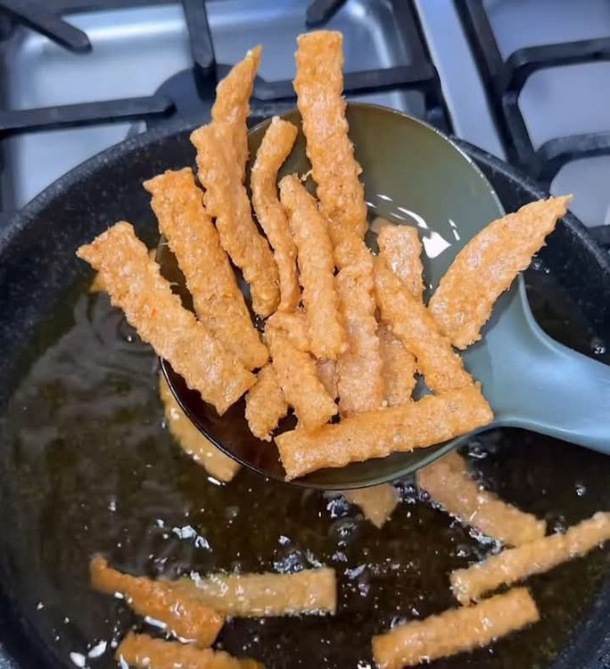 Step 1.2: Fry in a pan of hot vegetable oil until golden brown