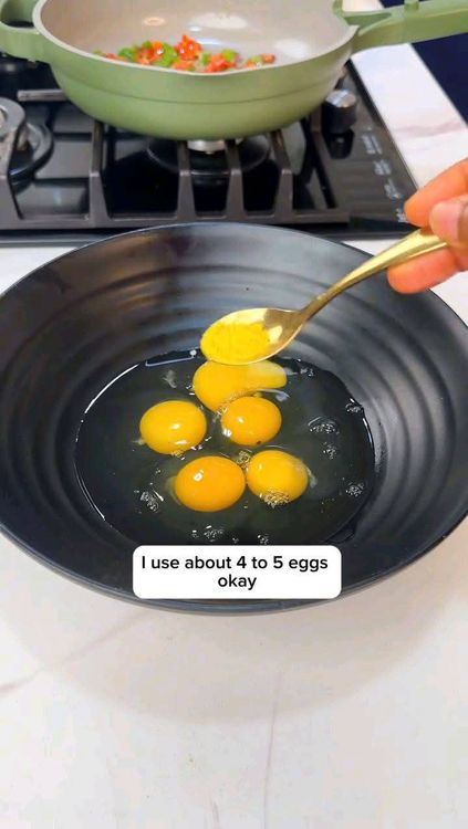 Step 3.2: Crack 4 to 5 eggs into a bowl and add seasoning powder and a little salt