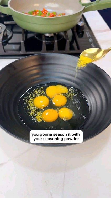 Step 3.3: Crack 4 to 5 eggs into a bowl and add seasoning powder and a little salt
