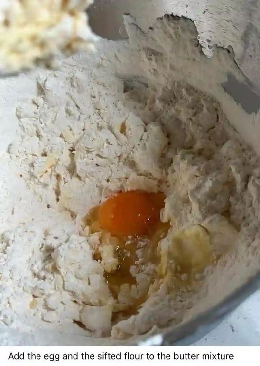 Step 1.1: Add the egg and sifted flour mixture to the butter mixture