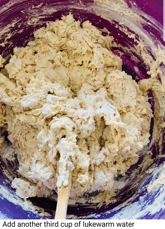 Step 1.4: Add warm water to the mixture