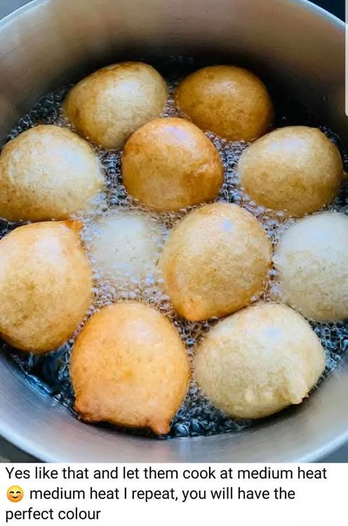 Step 1.3: Scoop with a deep small spoon or scoop the mold of your hand and Fry the dough until golden brown