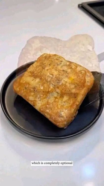 Step 1.3: Place the coated bread in the pan and cook all sides until golden brown and crispy