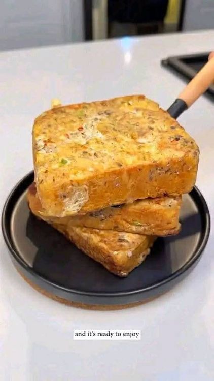 Step 1.1: Place the coated bread in the pan and cook all sides until golden brown and crispy