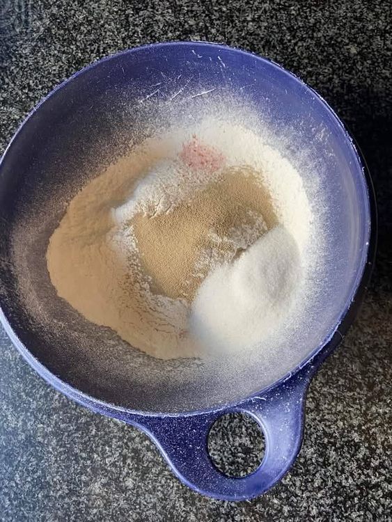 Step 1.2: Add the yeast and salt to the flour