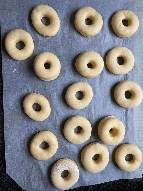 Step 2.1: Roll out the dough and use a doughnut cutter or a glass and bottle cap to shape the doughnuts