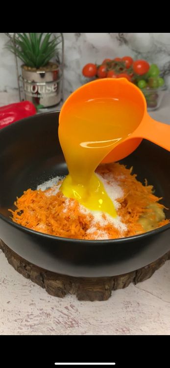 Step 1.6: Add mashed banana, shredded carrot, sugar, milk, melted butter, vanilla, and eggs into a bowl and mix until combined
