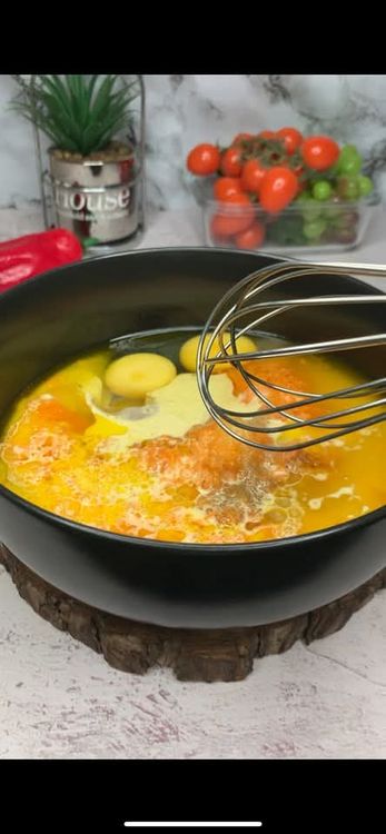 Step 1.1: Add mashed banana, shredded carrot, sugar, milk, melted butter, vanilla, and eggs into a bowl and mix until combined