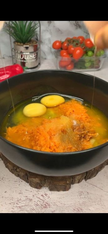 Step 1.5: Add mashed banana, shredded carrot, sugar, milk, melted butter, vanilla, and eggs into a bowl and mix until combined