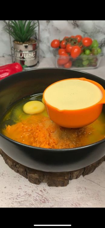 Step 1.7: Add mashed banana, shredded carrot, sugar, milk, melted butter, vanilla, and eggs into a bowl and mix until combined