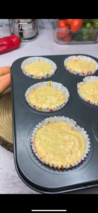 Step 2.1: Scoop the batter into a cupcake pan lined with cupcake liners