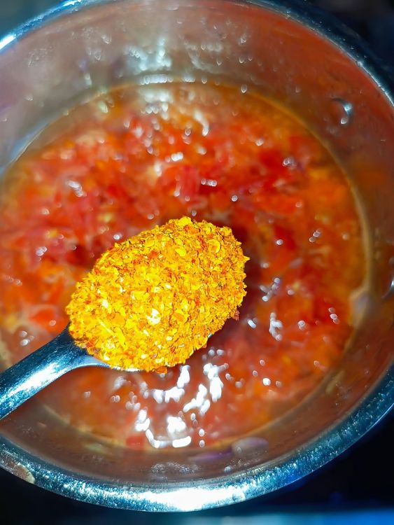 Step 1.2: Add the chopped fresh peppers, dry pepper, salt, and seasoning cubes