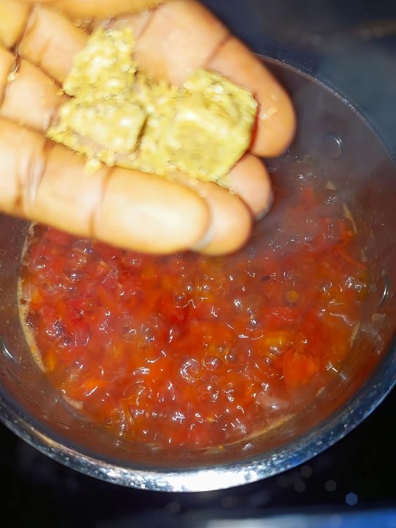 Step 1.3: Add the chopped fresh peppers, dry pepper, salt, and seasoning cubes