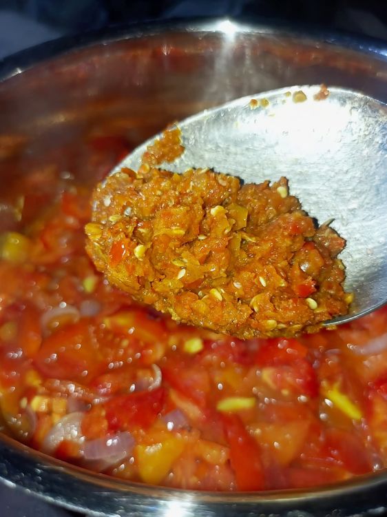 Step 1.4: Add garlic powder, ginger powder, onion powder, chicken Maggi seasoning, coarsely grinded fresh peppers, and salt