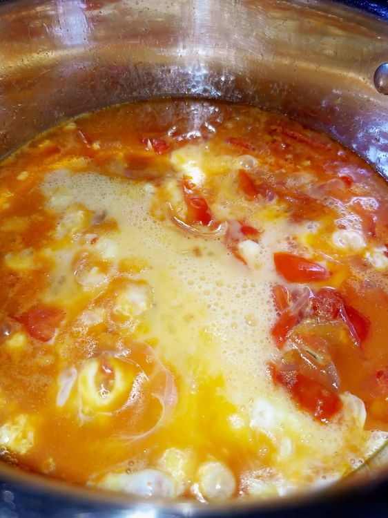 Step 1.1: Whisk the eggs and pour them evenly across the pot, ensuring they spread out