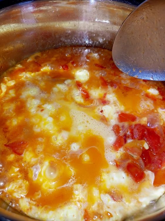 Step 1.3: Whisk the eggs and pour them evenly across the pot, ensuring they spread out
