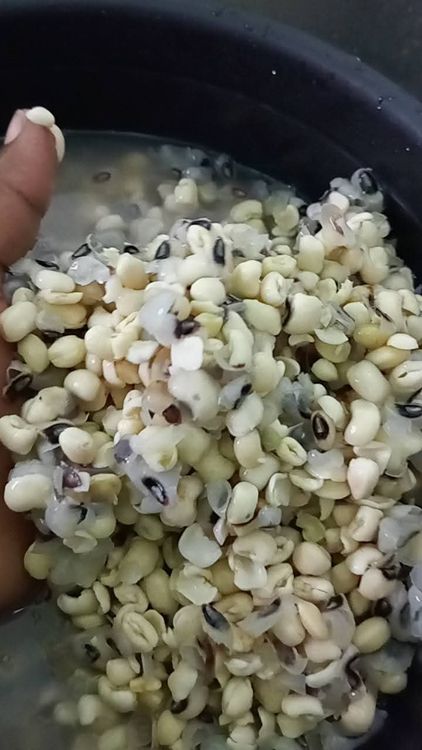 Step 1.1: Use a sieve to separate the skin peels and water from the beans