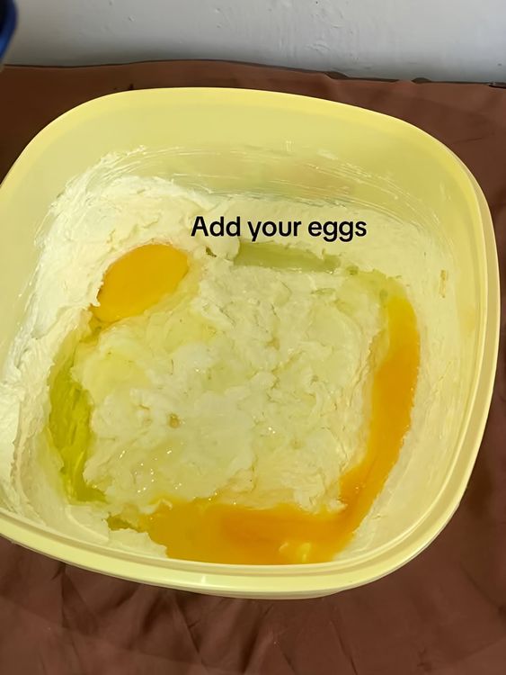 Step 1.1: Add the eggs one at a time and mix thoroughly after each addition