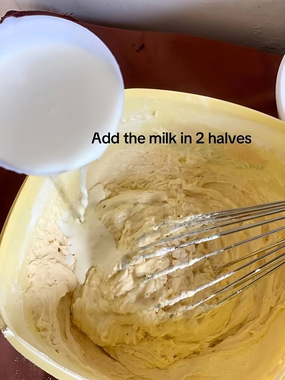 Step 1.1: Add the milk in two halves, mixing well after each addition