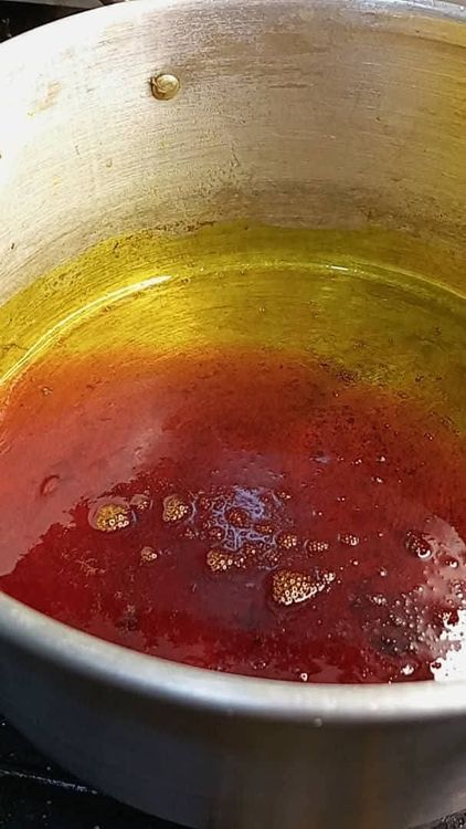 Step 1.1: Place a dry pot on a burner and pour in red oil