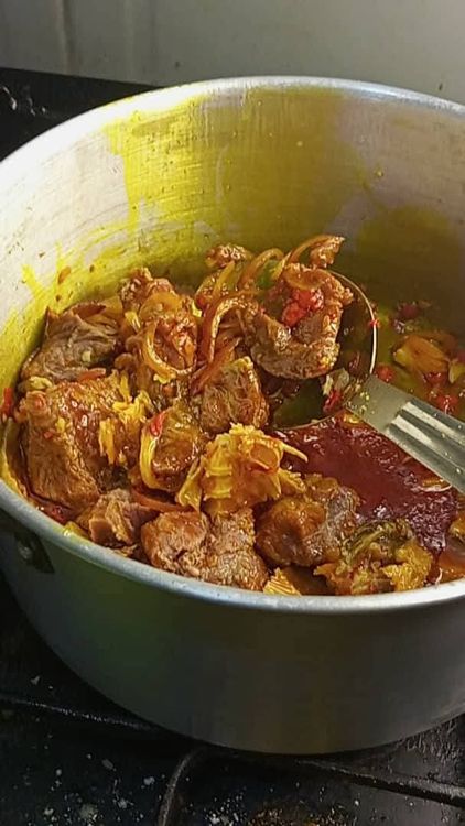 Step 1.2: Stir fry the proteins in the sauce for a few seconds, then add a quarter portion of the coarsely ground crayfish and keep the rest