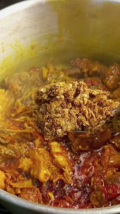 Step 1.3: Stir fry the proteins in the sauce for a few seconds, then add a quarter portion of the coarsely ground crayfish and keep the rest