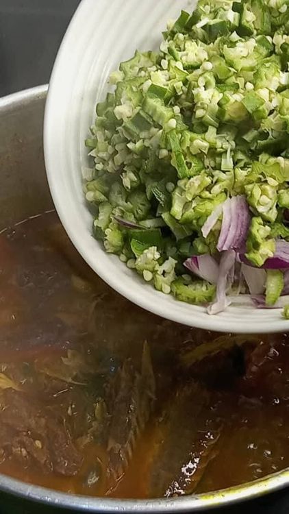 Step 1.5: After 1 minute, add the remaining portion of chopped okra and onion, along with the remaining coarsely blended fresh pepper, and stir together