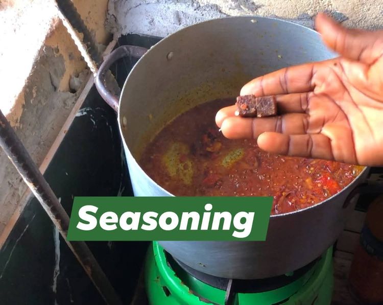 Step 2.3: Add chopped onions,stir fry for 1 minute,add ehuru powder (optional), coarsely ground fresh peppers, onions and crayfish