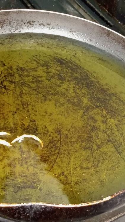 Step 3.4: Heat oil in a deep pan on medium heat